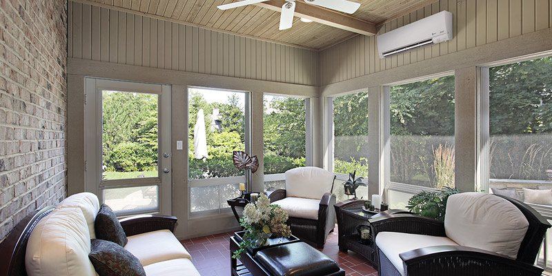 mitsubishi ductless ac on wall in sun room